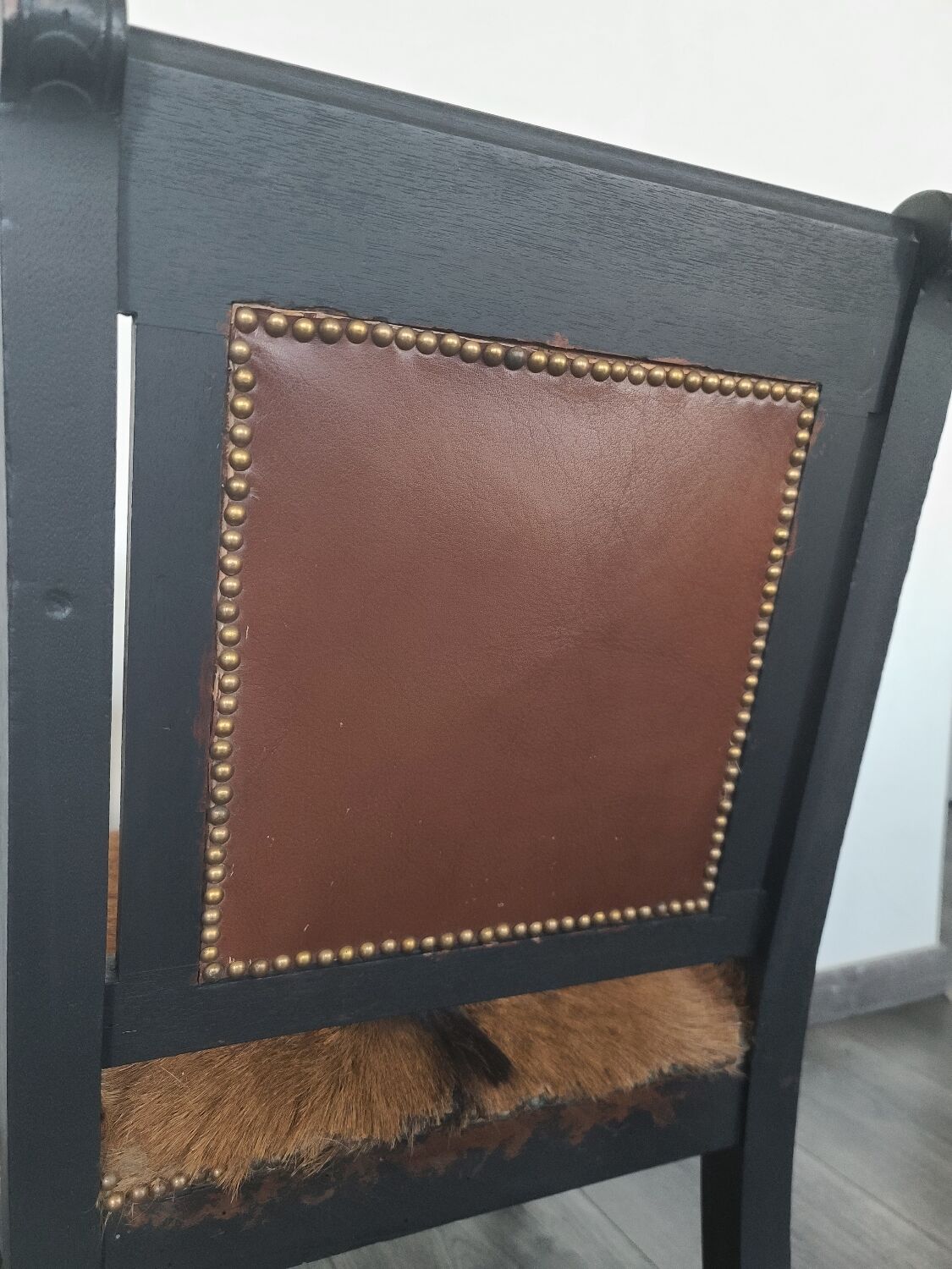 Character armchair in black wood and animal skin #CHMR