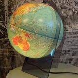 Luminous terrestrial globe with smoked plexiglass base