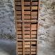 Antique hardware cabinet with 48 drawers, circa 1900.