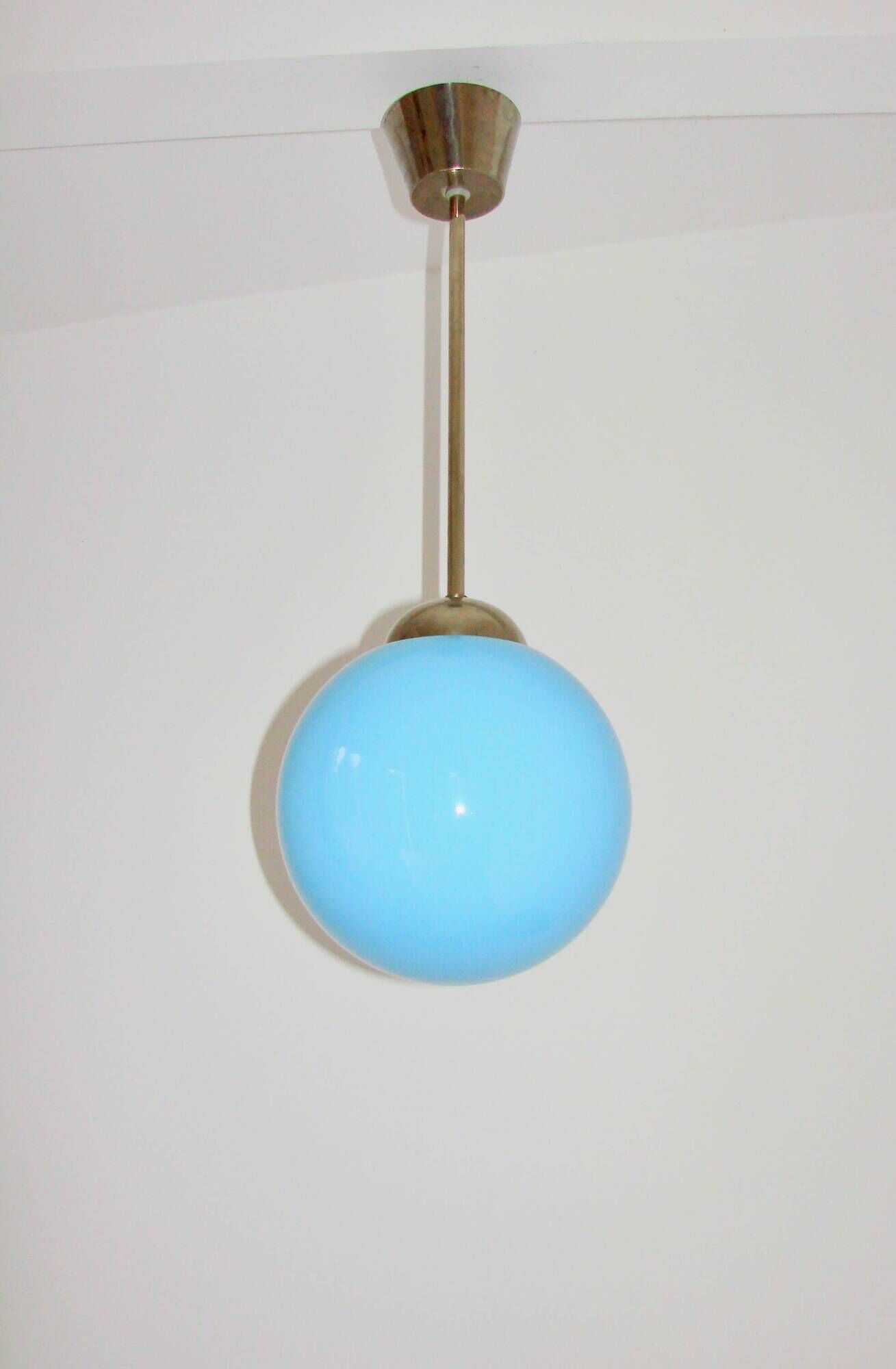 A pendant lamp with a blue glass shade, 1940s.