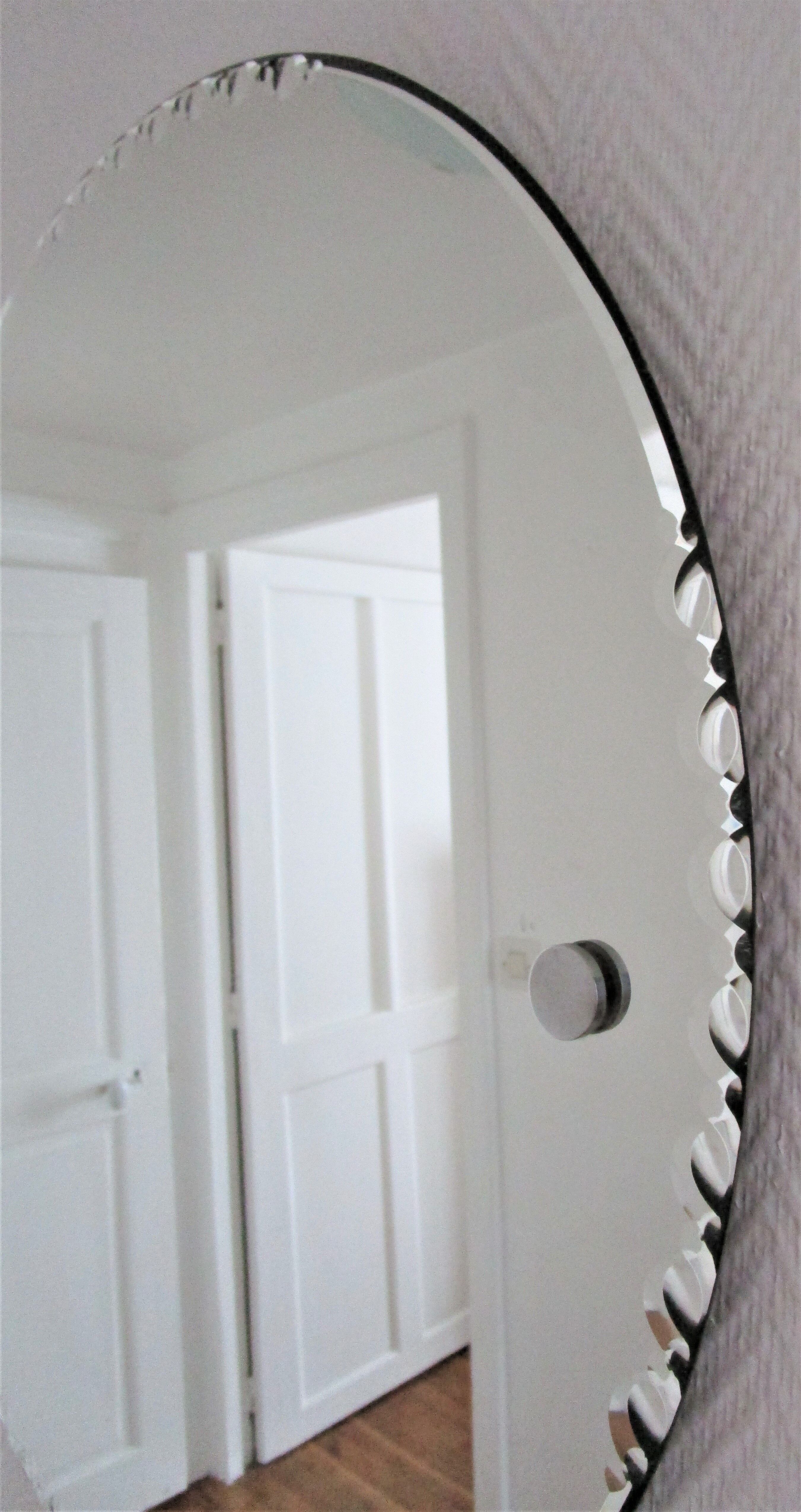 Round mirror with bevelled rim of the 60s diameter 66 cm