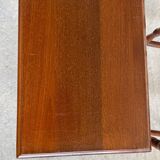 2 wooden nesting tables with molded legs