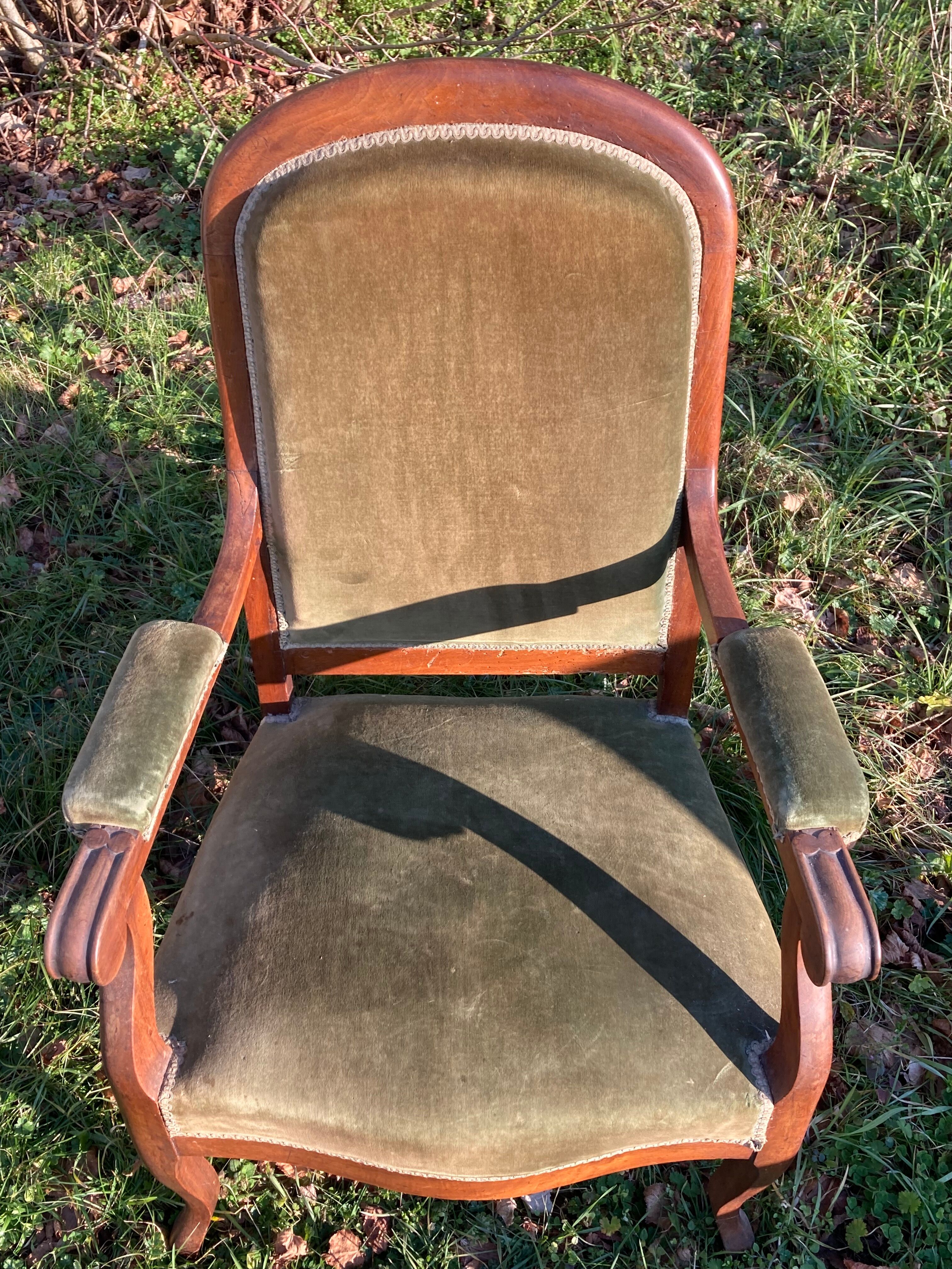 Antique Voltaire armchair in wood and green velvet Louis Philippe