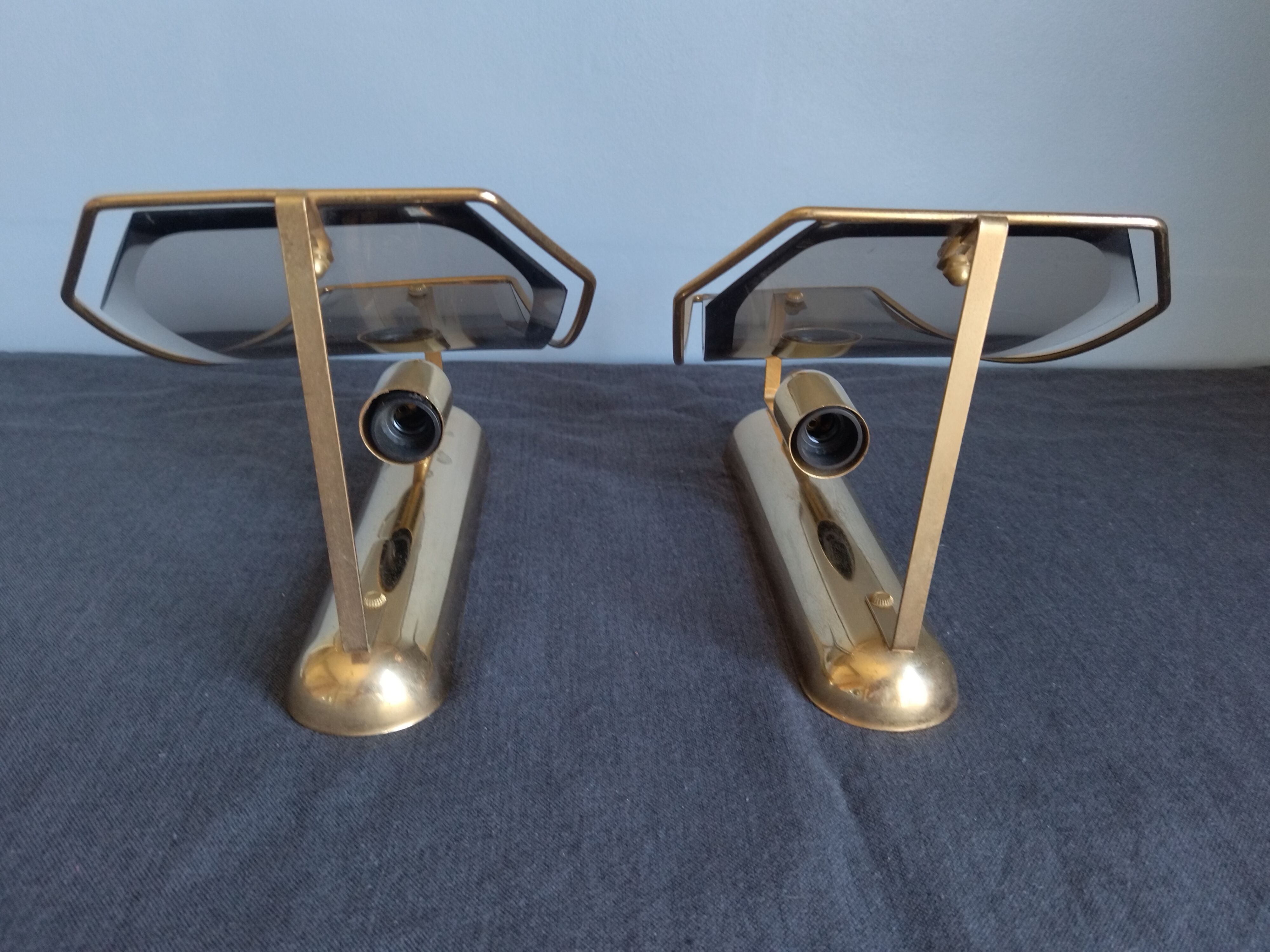 Pair of brass and curved glass wall lamps from the 80s