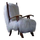 Henning Kjærnulf, armchair reupholstered in long-haired Icelandic sheepskin, 1950