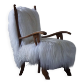 Henning Kjærnulf, Fauteuil retapissé en peau de mouton islandaise à poils longs, 1950