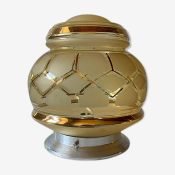 Plafonnier globe ambre et liseré doré