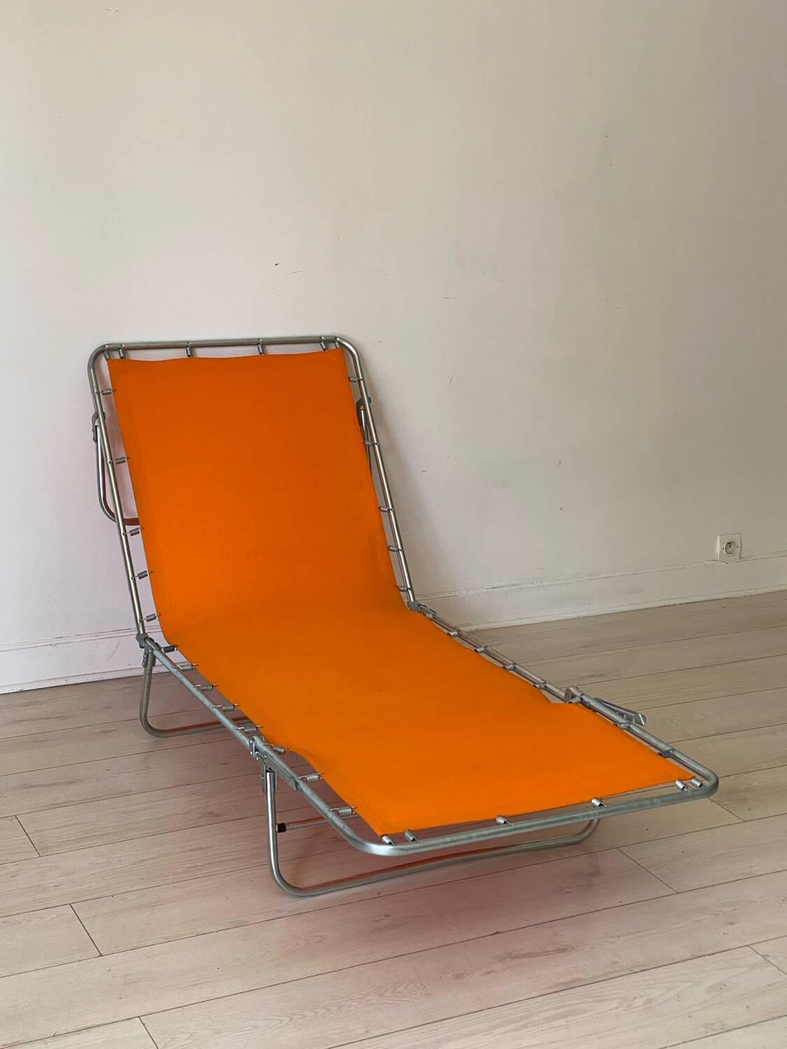 Orange and metal deckchair 1970