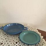 Two matching enameled dishes in green and blue