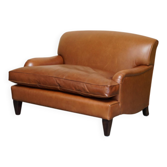 Two-seater leather armchair in Howard style by George Smith.