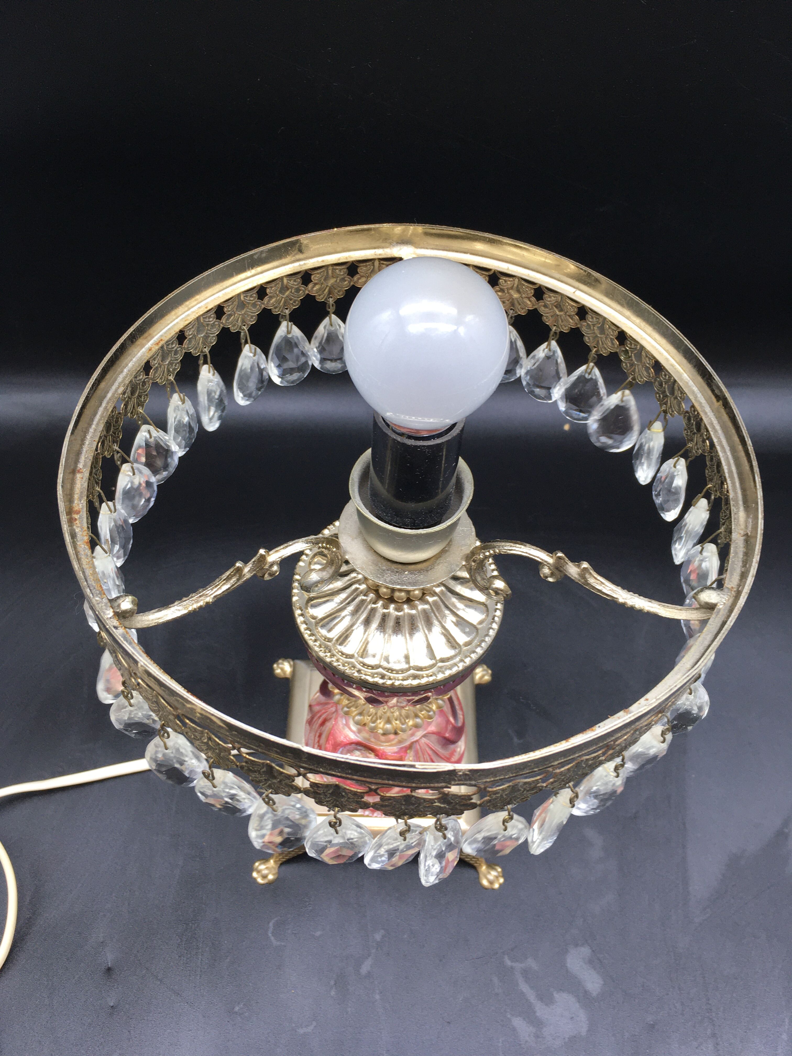 Vintage bedside with grapevines and chiseled crystal