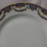 Lot de 12 assiettes à dessert en porcelaine de limoges.