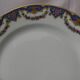 Set of 12 limoges porcelain dessert plates.