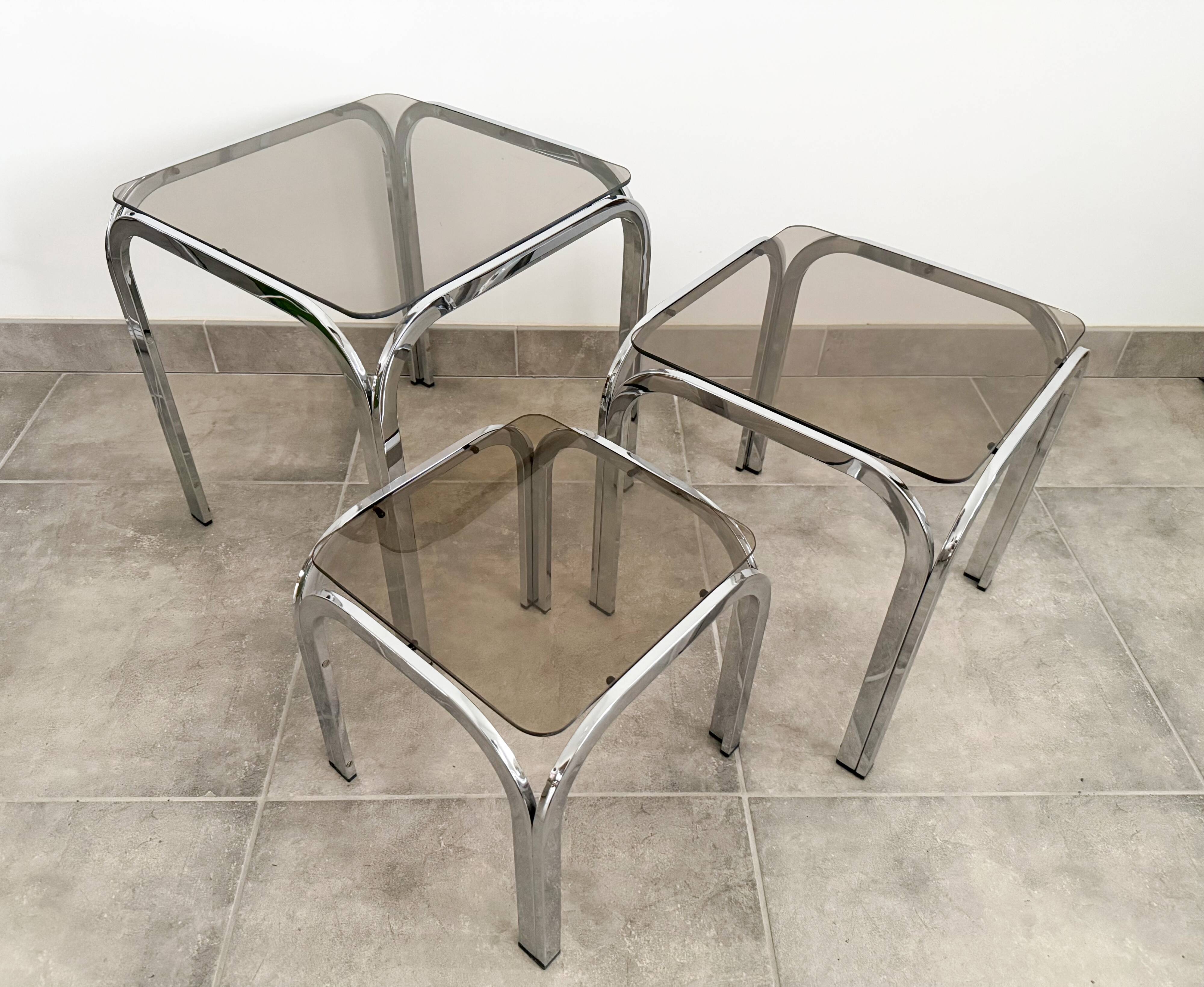Set of 3 nesting tables, chrome and smoked glass, 1970s.