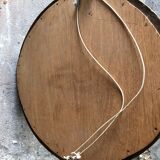 Gold oval mirror