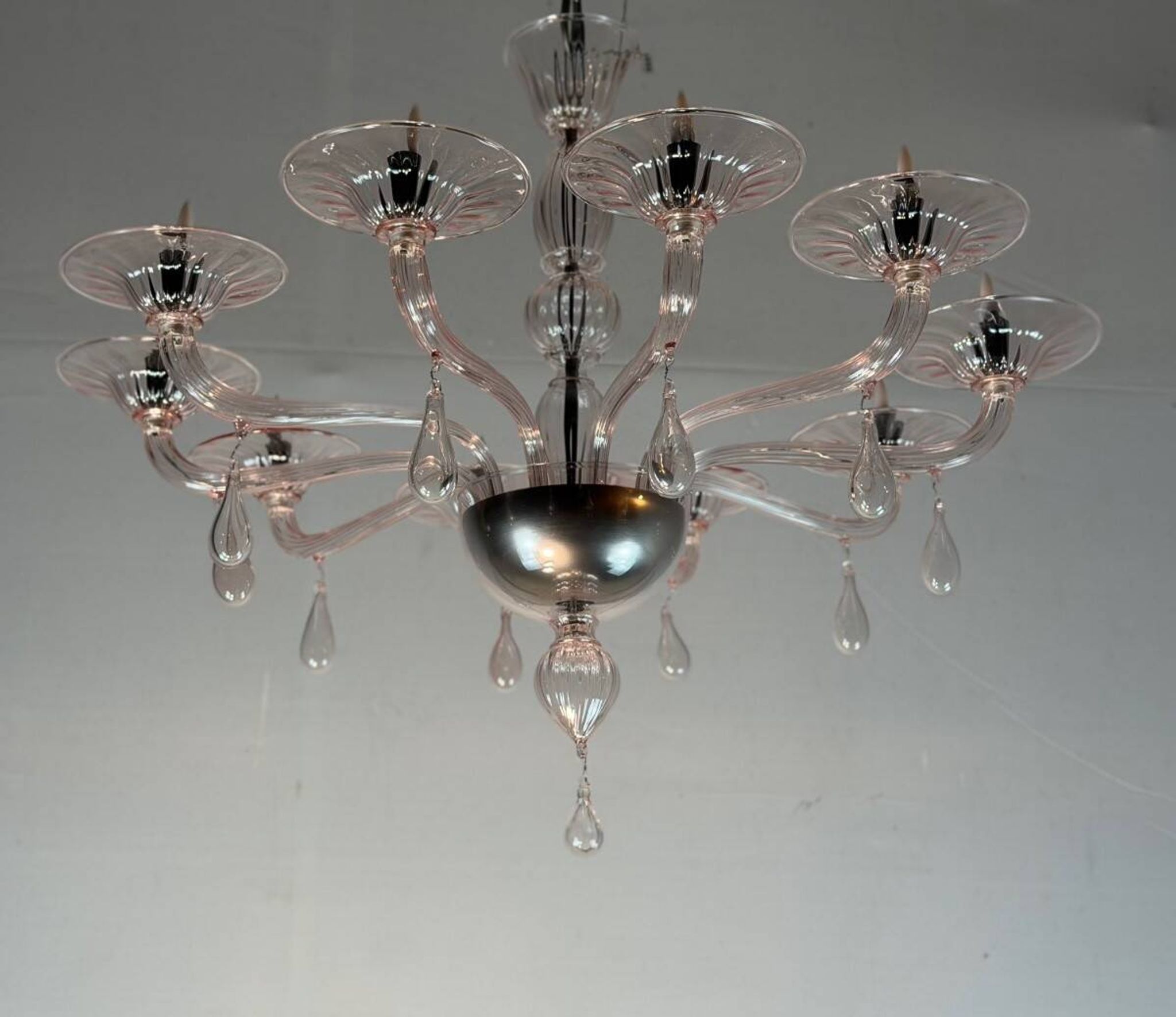 Venetian glass lustre in pink, in the style of Venini.