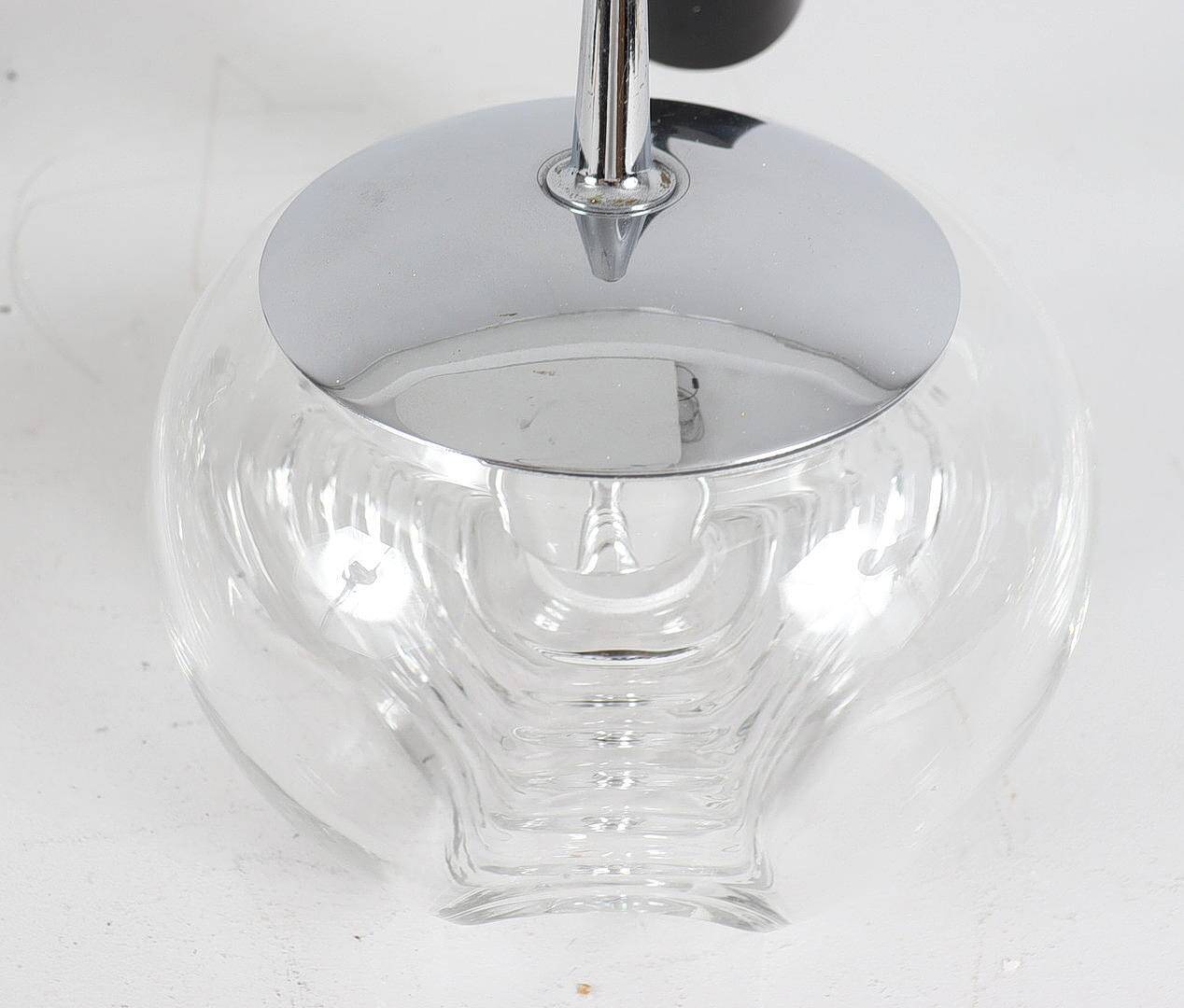 Koch & Lowy. Ensemble de 2 lampes de plafond de Peil et Putzler, modèle : 'Futura', Allemagne, années 1970.