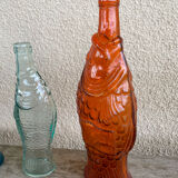 3 glass bottle fish