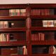 pair of Globe Wernicke London 'waterfall' bookcases in mahogany circa