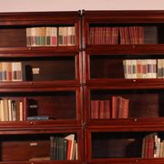pair of Globe Wernicke London 'waterfall' bookcases in mahogany circa