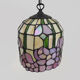 Tiffany pendant lamp in glass paste with floral decoration.