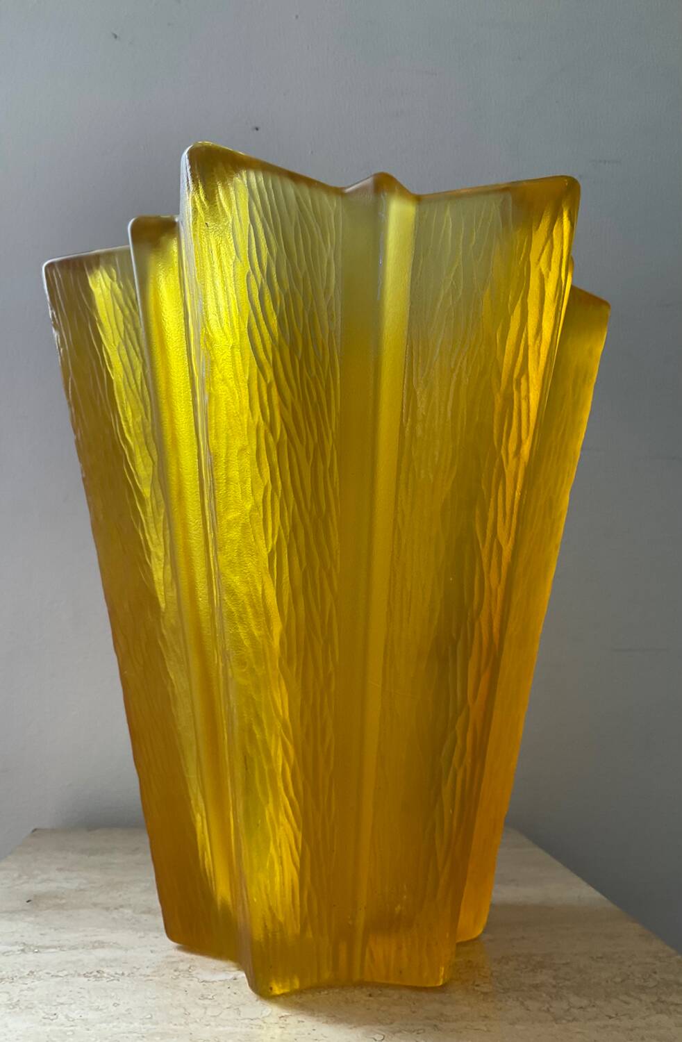 Art Deco star vase in yellow glass from the 1950s