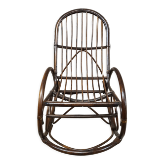 Rocking-chair in rattan bamboo 1970 vintage