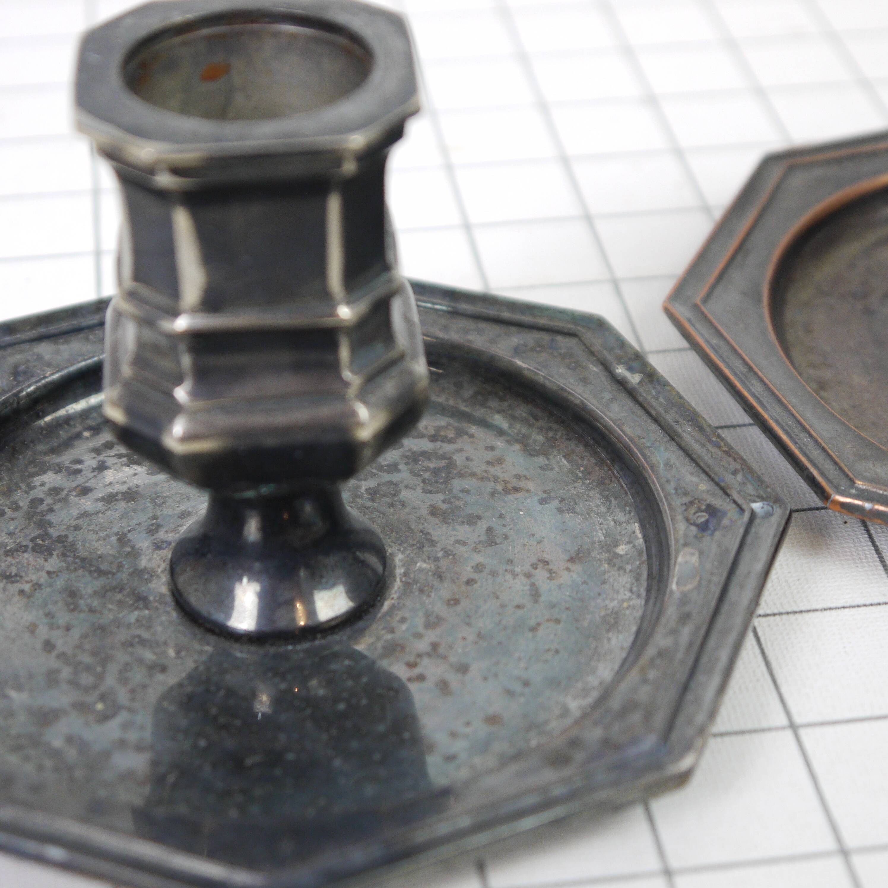 Pair of metal candlesticks