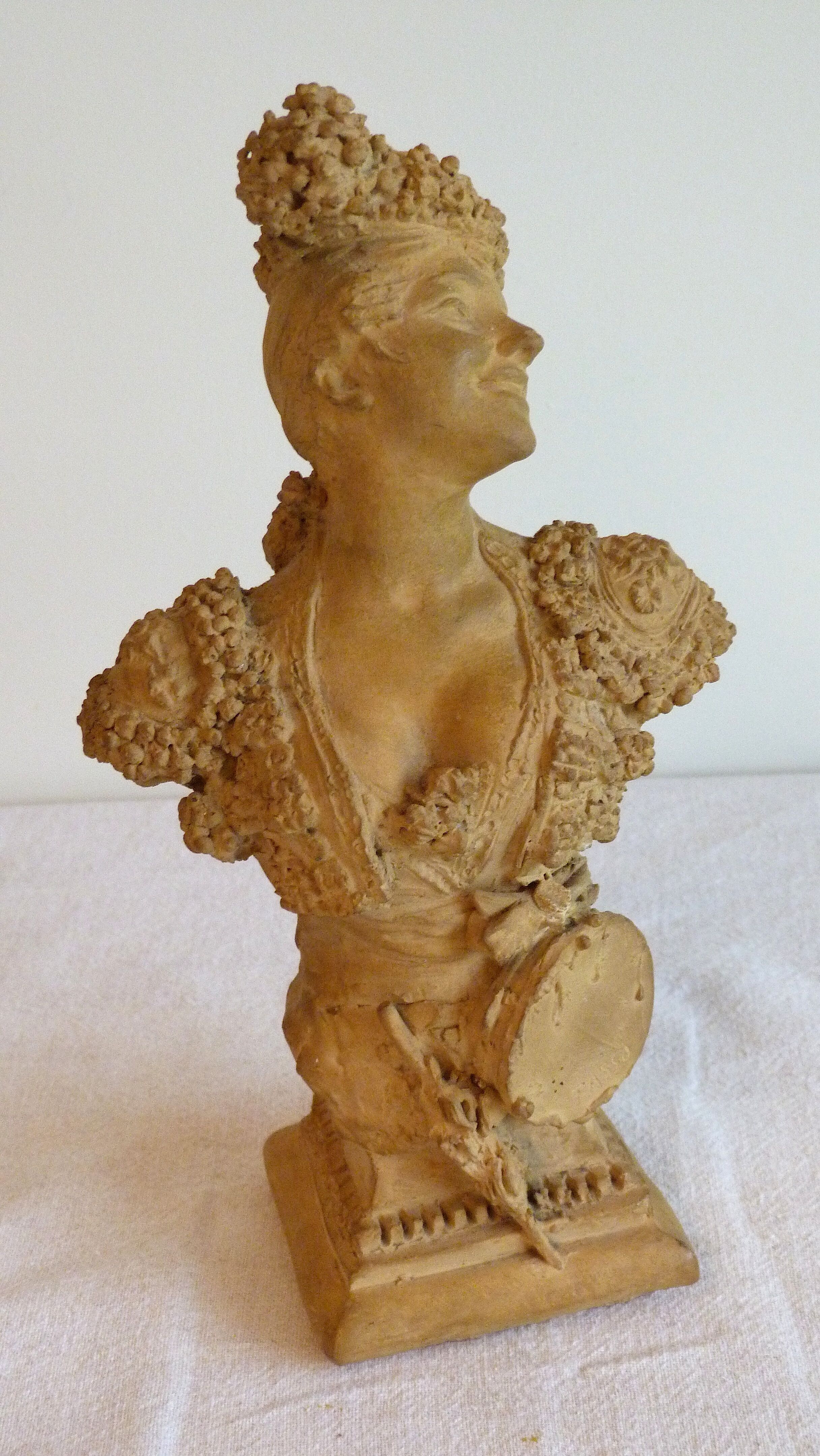 Terracotta bust of a woman signed Torcuato Tasso Y Nadal