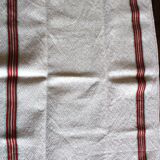 Old chevron towel with red and green stripes.
