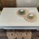 Low table in exotic wood with its safety glass