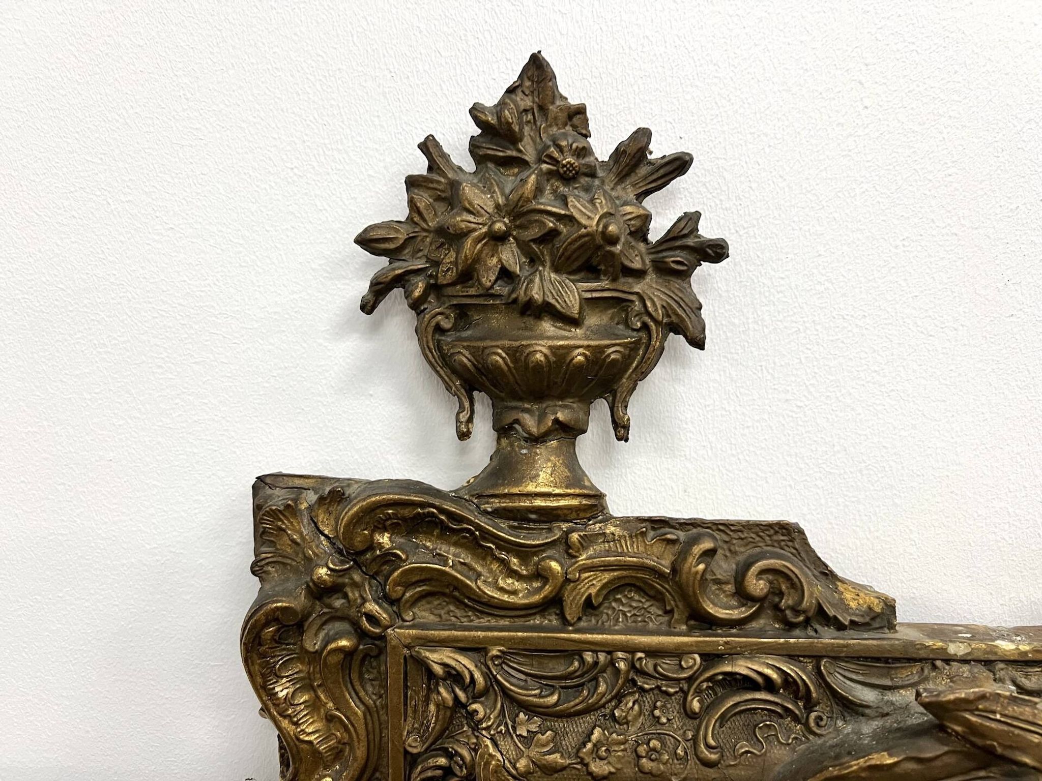 Large antique pediment mirror with mouldings.
