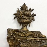 Large antique pediment mirror with mouldings.