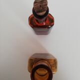 2 amber apothecary bottles