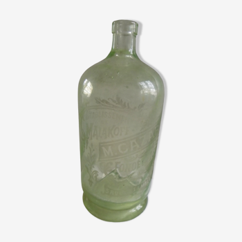 Green glass bottle engraved cazard paris founded in 1872 before 1900