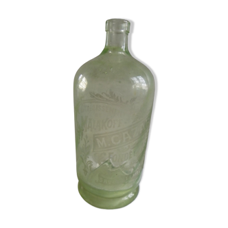 Green glass bottle engraved cazard paris founded in 1872 before 1900