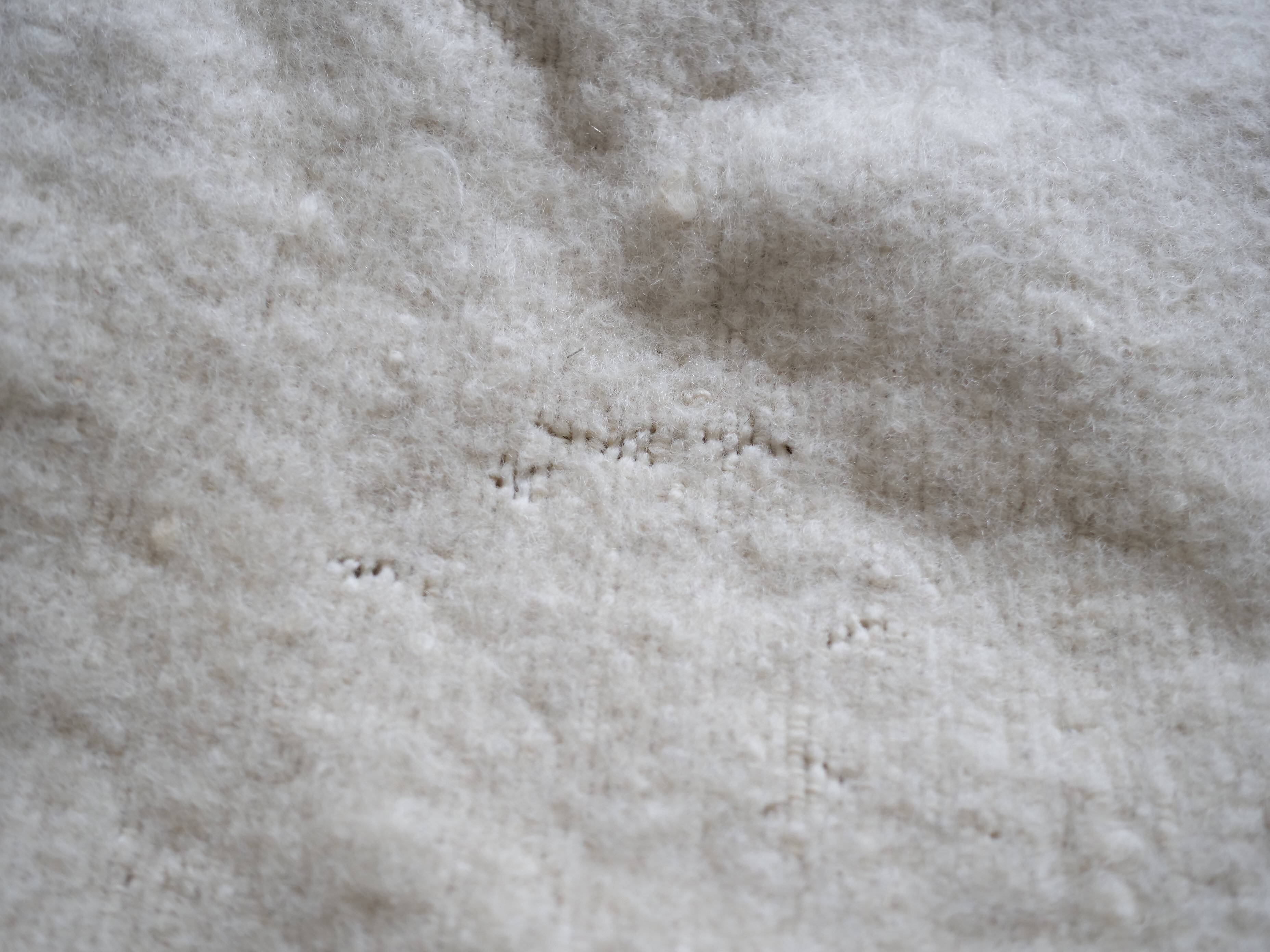 Vintage ecru natural wool round rug