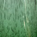 Green Biot blown glass vase