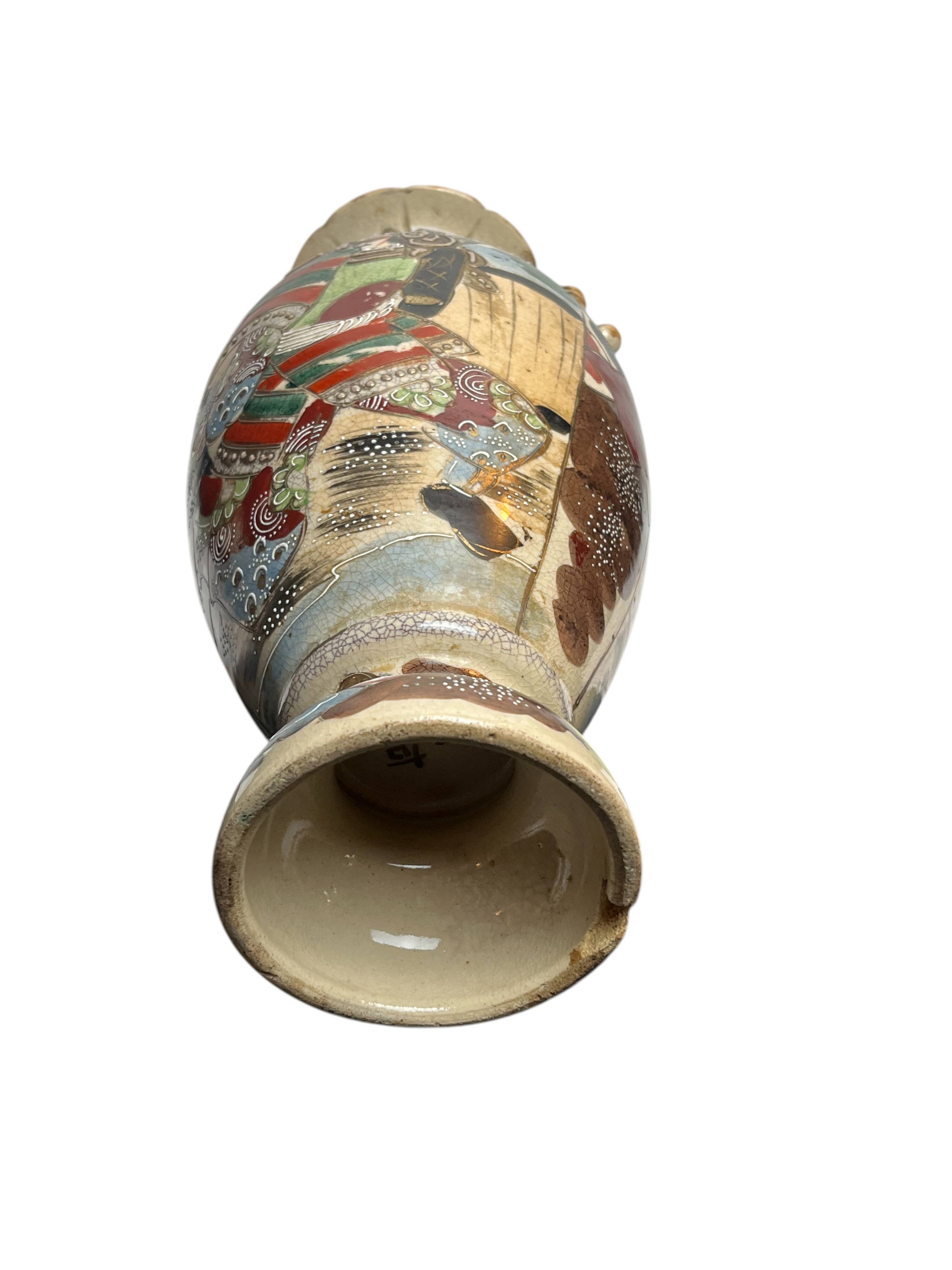 Japan, Satsuma vase with richly decorated handles, signed, early 20th century