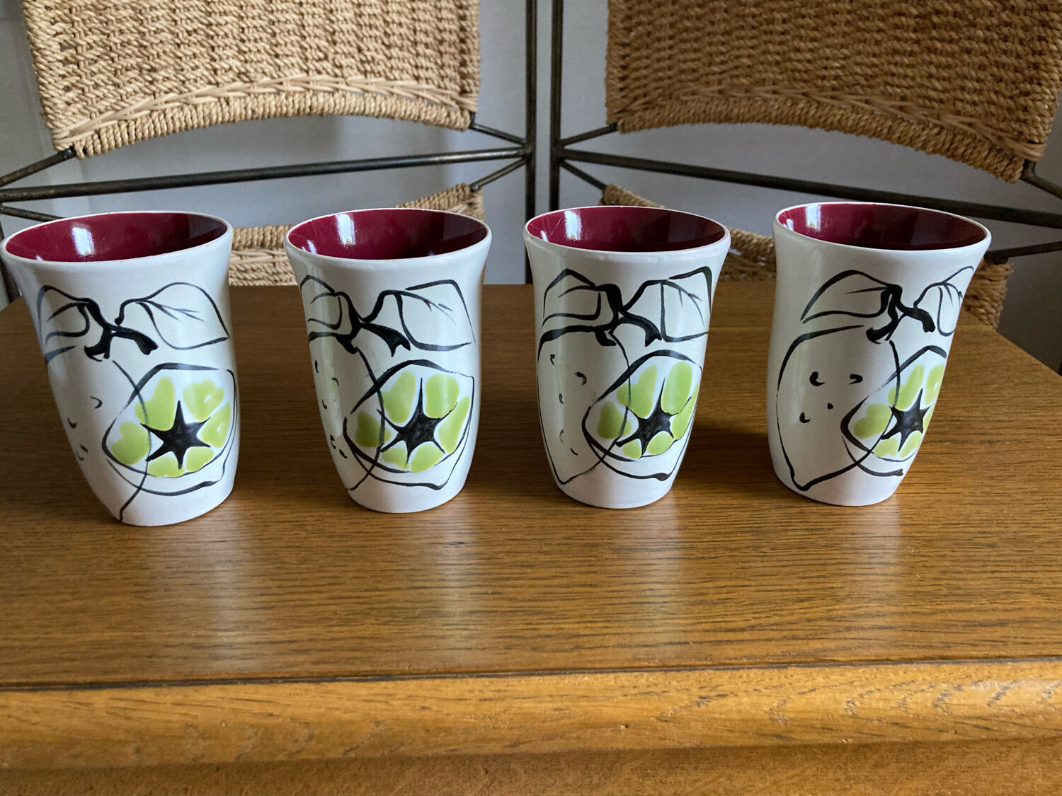 Set of four enameled stoneware glasses
