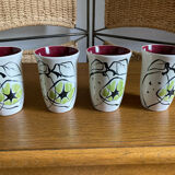 Set of four enameled stoneware glasses