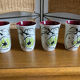 Set of four enameled stoneware glasses