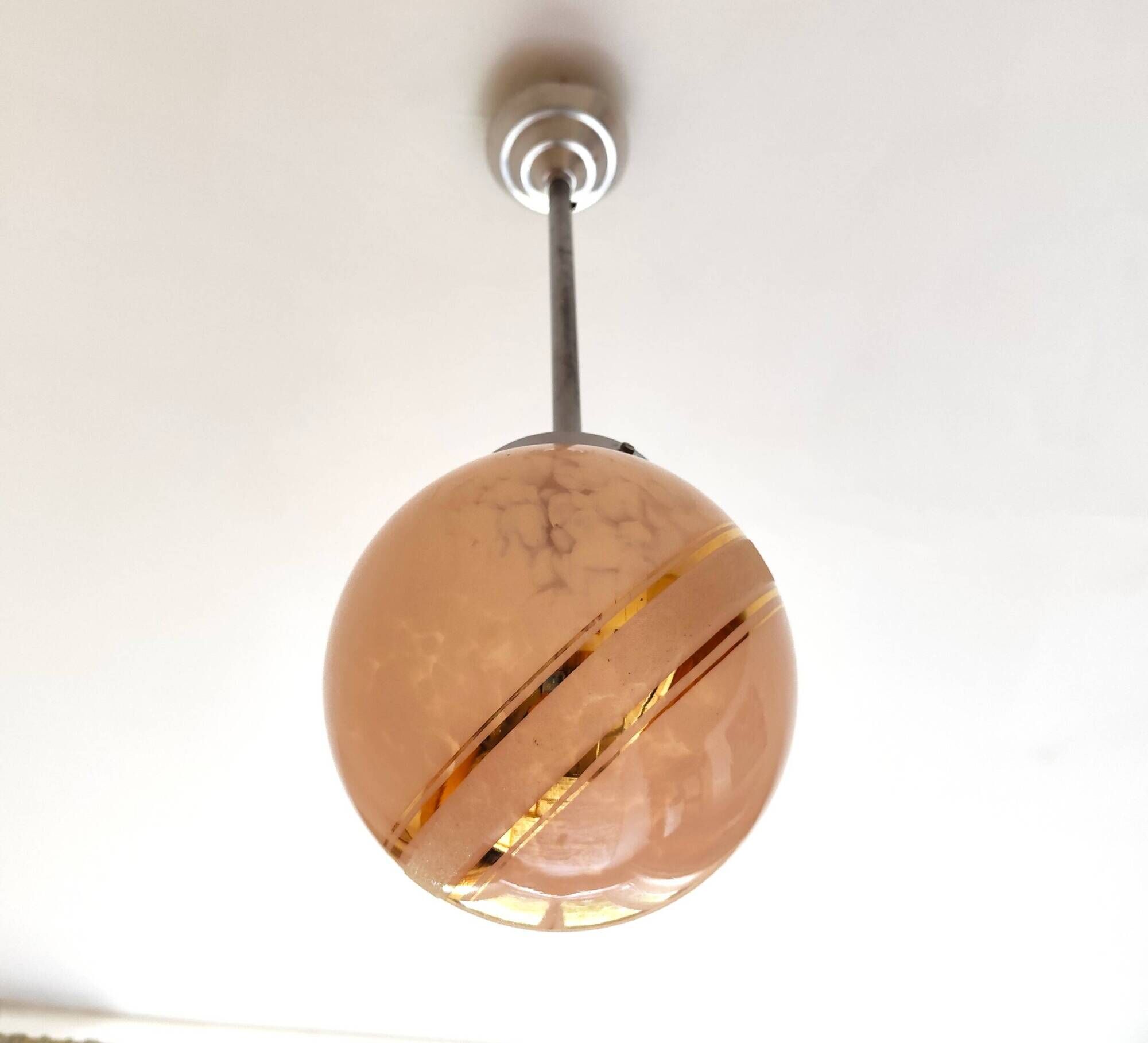 suspension glass globe pink and gold on a metal aluminium stem and structure