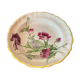 Plat en faience fin XVIIe début XIXe à décor de fleurs violettes
