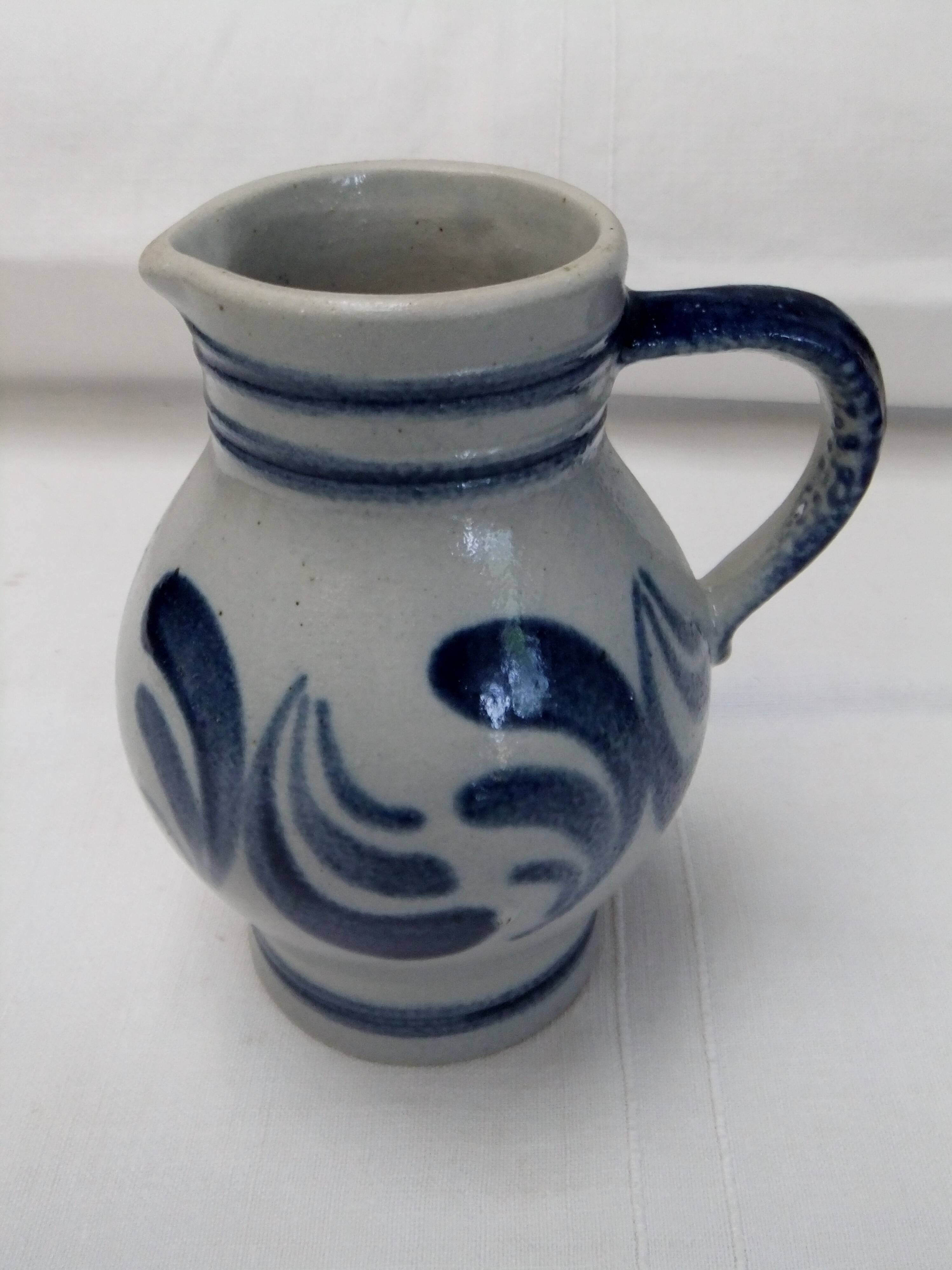 Handmade glazed stoneware pitcher with Handarbeit inscription