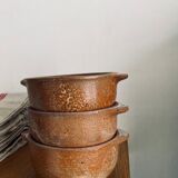 Set of three bowls in ancient sandstone