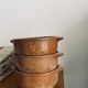 Set of three bowls in ancient sandstone