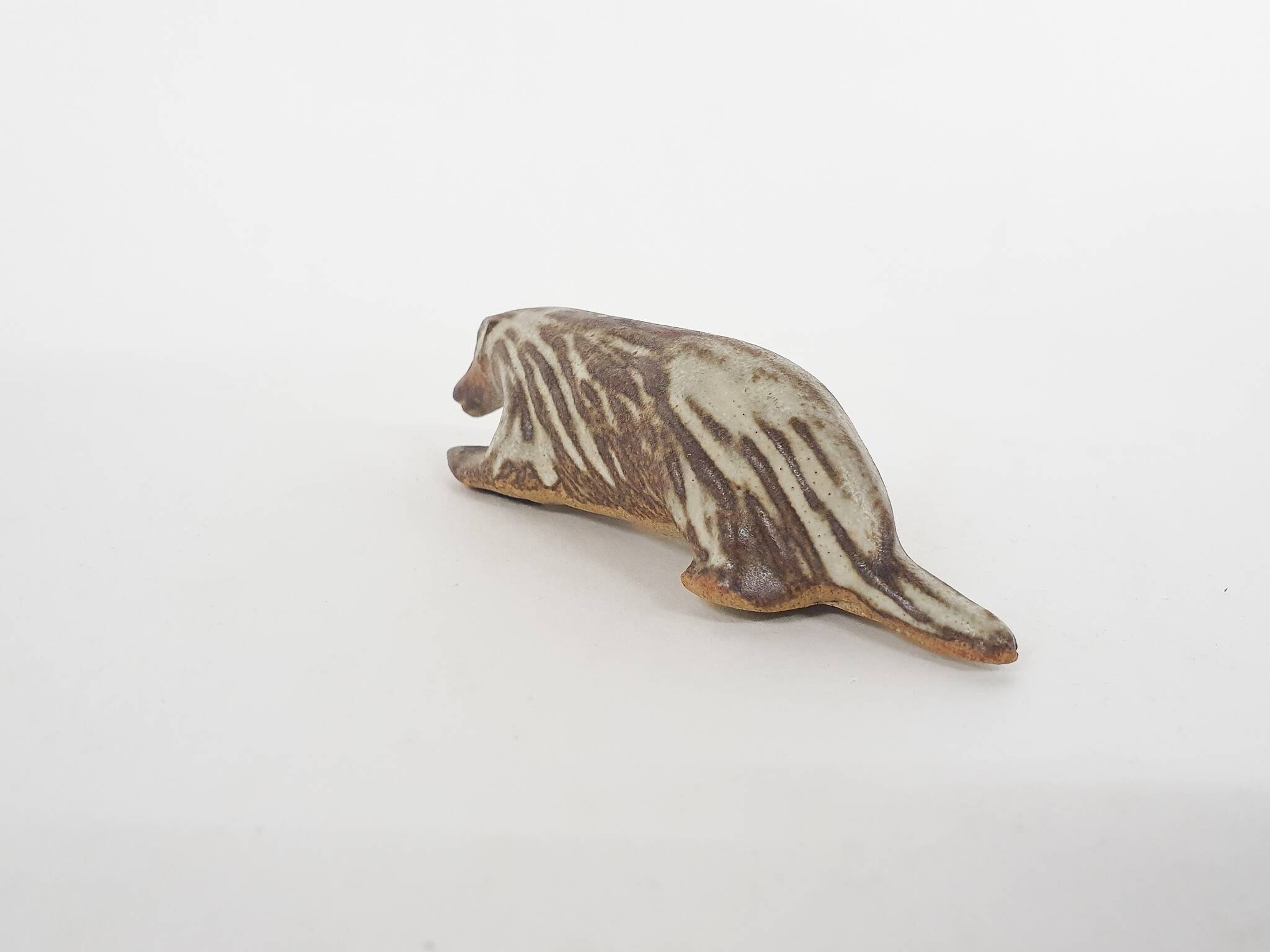 Small ceramic skunk sculpture by Tremar Pottery, United Kingdom