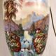 Large pair of 19th century polychrome porcelain vases decorated with landscapes, mounted as lamps