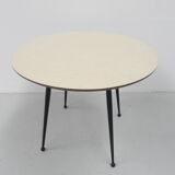Vintage coffee table with round formica top